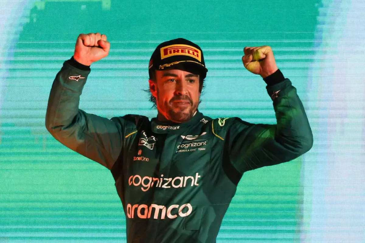 Fernando Alonso of Aston Martin celebrates on podium after finishing 3rd in the season opener Formula One Grand Prix of Bahrain - March 2023