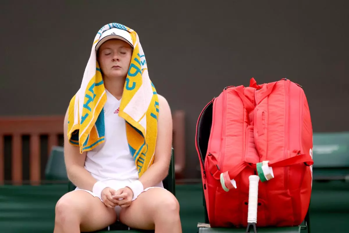 Francesca Jones appears dejected after losing the first set during her first round ladies' singles match - June 2021
