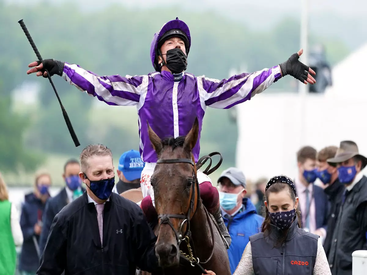 Frankie Dettori and Snowfall win the Oaks at Epsom
