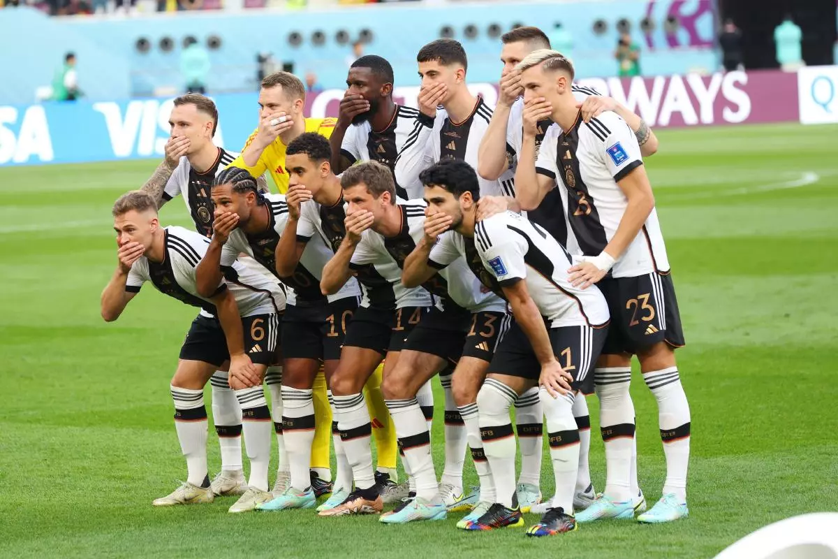 Germany team protest before World Cup match with Japan