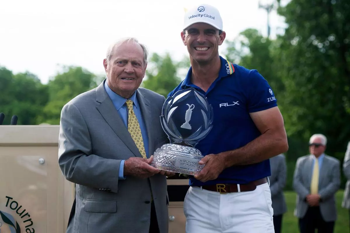 Golf legend Jack Nicklaus (left) presents the Jack Nicklaus Memorial Trophy to the 2022 winner, Billy Horschel