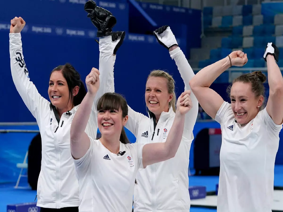 Great Britain's Eve Muirhead, Hailey Duff, Vicky Wright and Jennifer Dodds celebrate winning women's curling semi-final at the Winter Olympics
