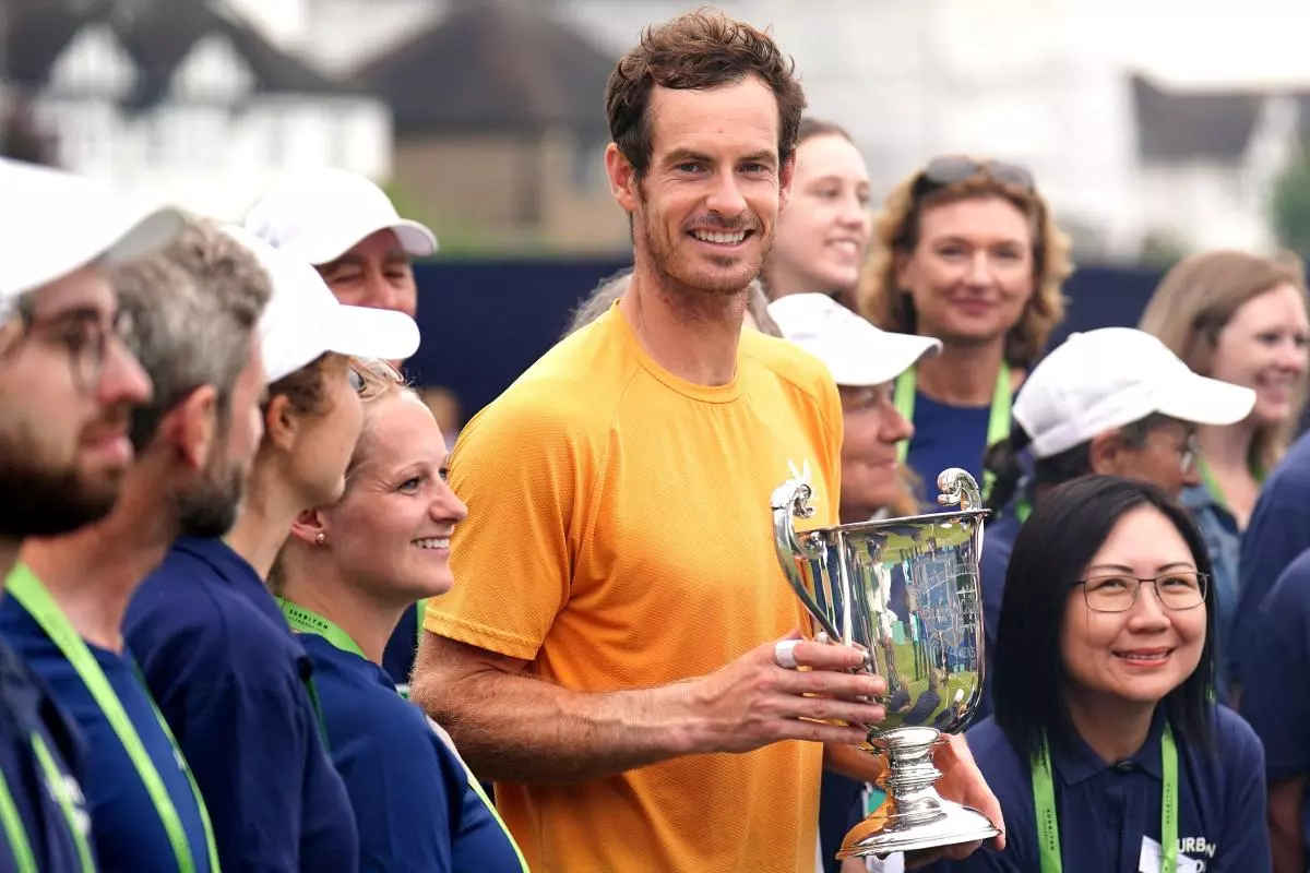 Great Britain's Andy Murray celebrates with the trophy
