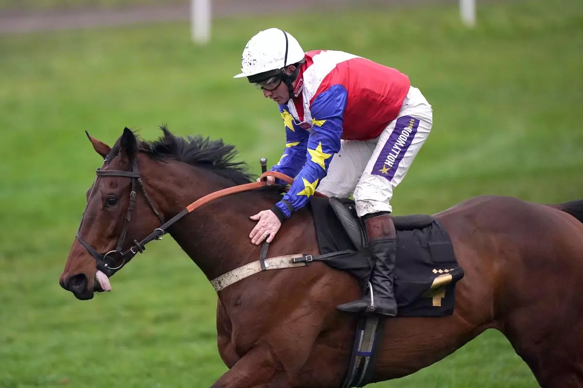 Hansard ridden by jockey Jamie Moore December 2022