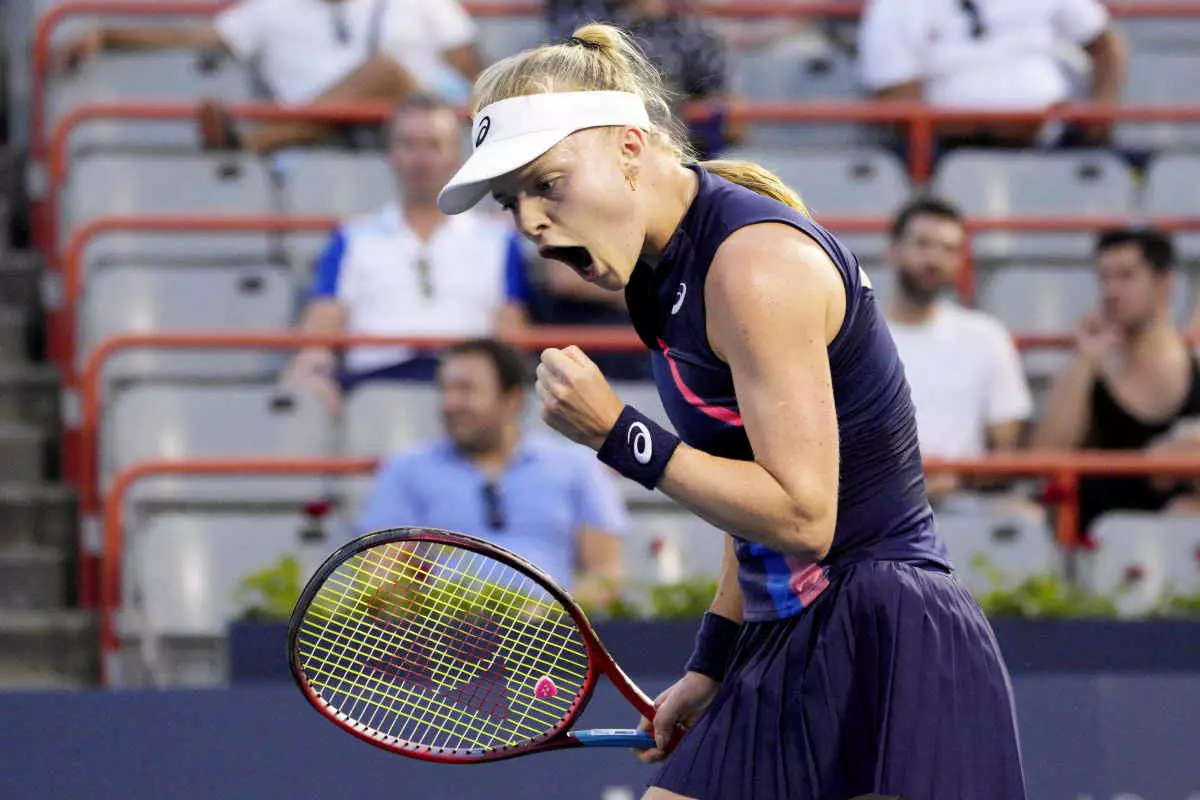 Harriet Dart, of the United Kingdom, celebrates after winning the first set during National Bank Open women's tennis action against Leylah Fernandez, of Canada, in Montreal, Monday, Aug. 9, 2