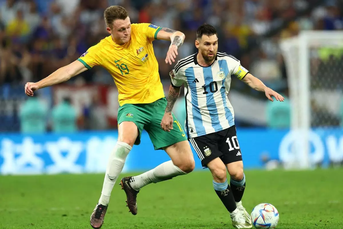 Australia's Harry Souttar tackles Lionel Messi
