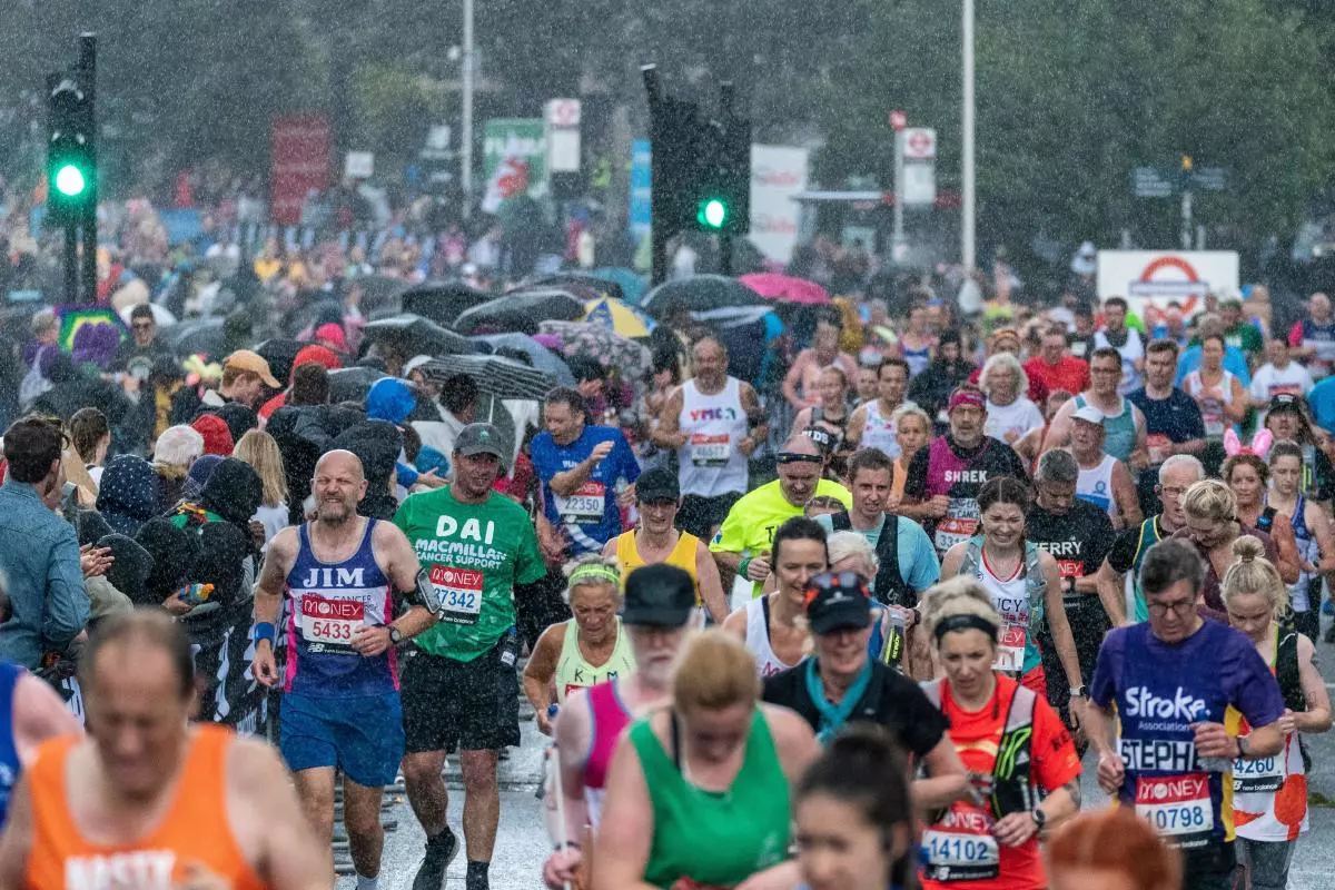 Heavy rain hit late on in the Virgin Money London Marathon 2021 as the fun runners passed through Tower Hill