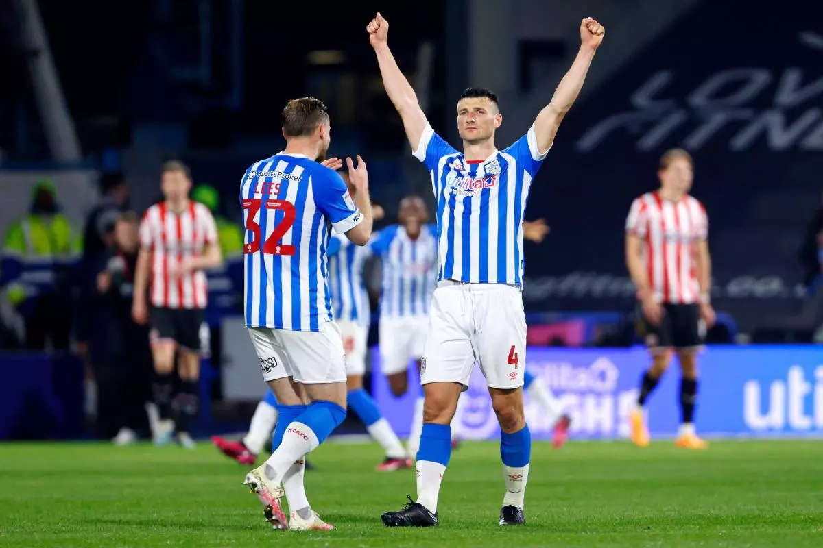 Huddersfield Town's Matty Pearson (right) celebrates