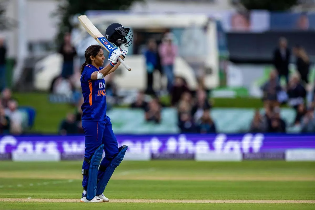 India's Harmanpreet Kaur celebrates reaching a century