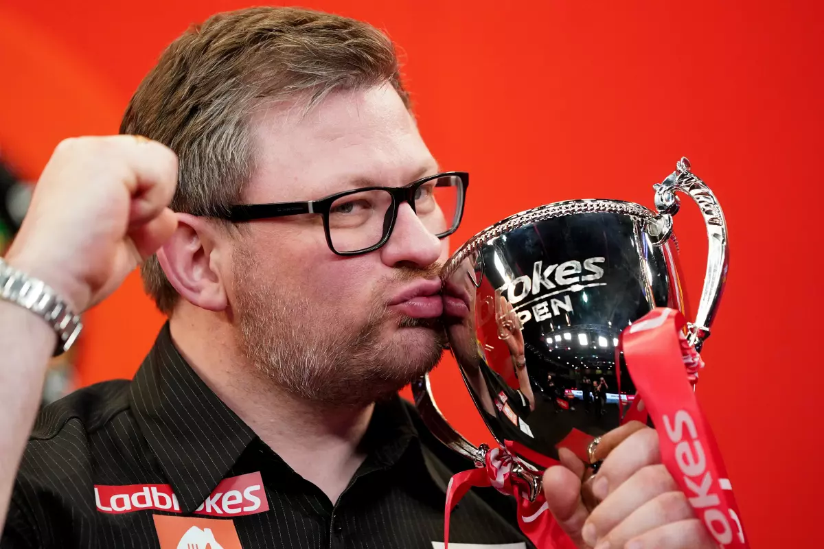 James Wade celebrates after winning the Ladbrokes UK Open 2021 tournament at the Marshall Arena, Milton Keynes during day three. Picture date: Sunday March 7, 2021.