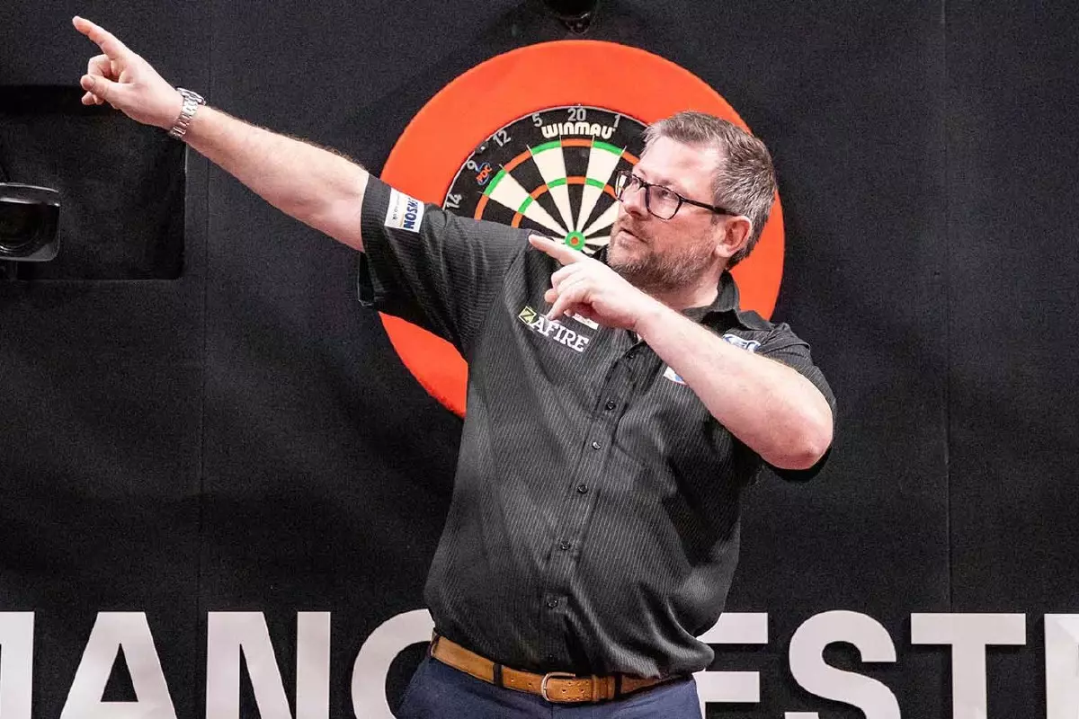 James Wade celebrates winning week ten Premier League win