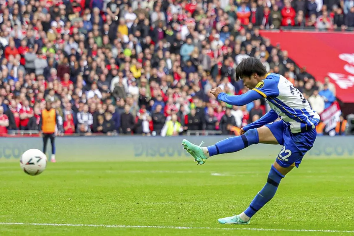 Japan winger Kaoru Mitoma of Brighton is in action during a FA Cup semifinal against Manchester United - April 2023