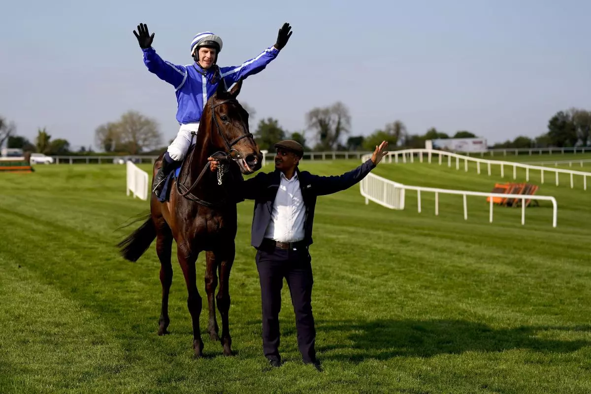 Jockey Paul Townend celebrates on Energumene after winning the William Hill Champion Chase December 2022