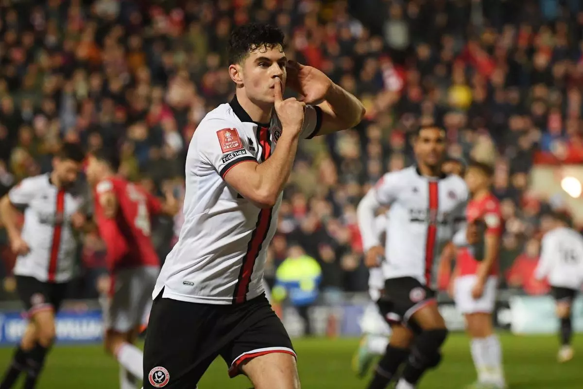 John Egan of Sheffield Utd celebrates the equaliser