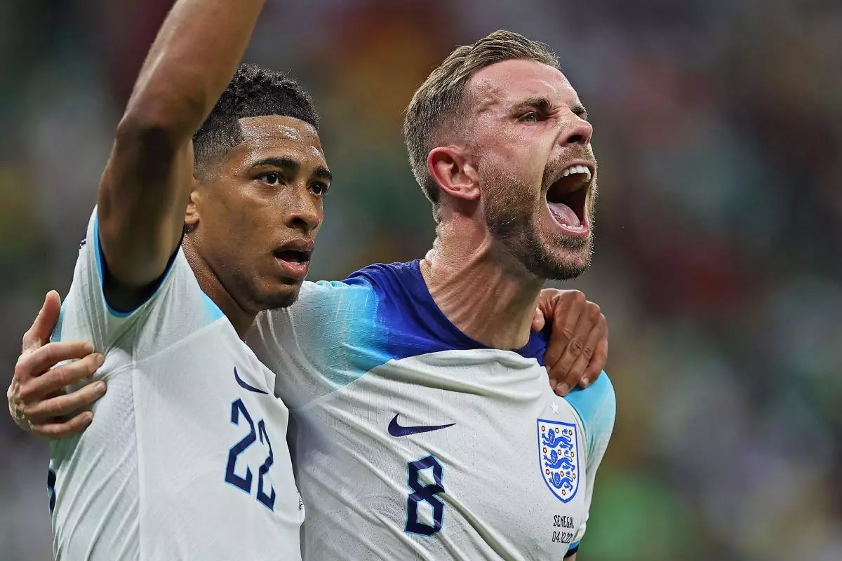 Jordan Henderson of England celebrates his goal with Jude Bellingham