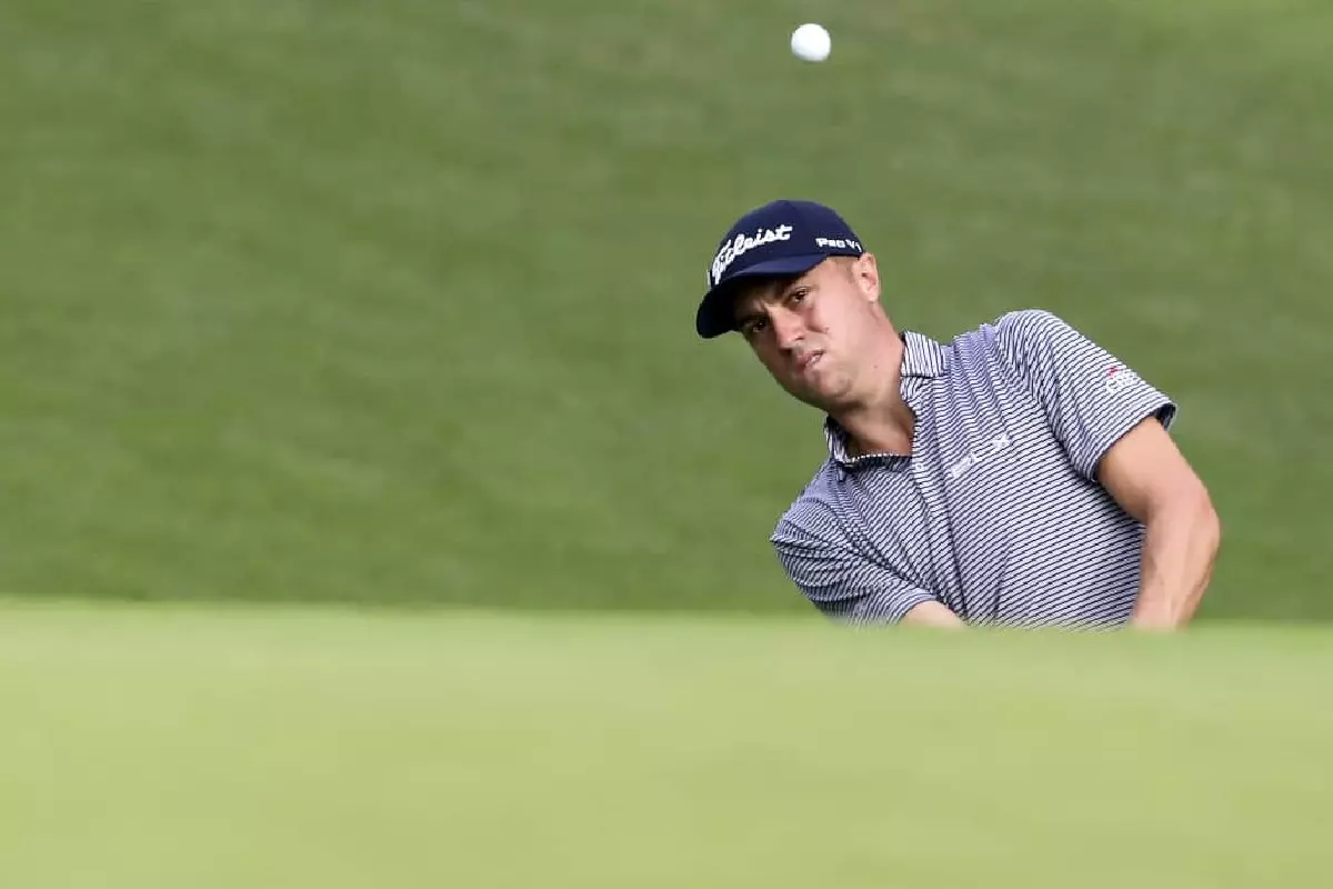 Justin Thomas chips at Augusta