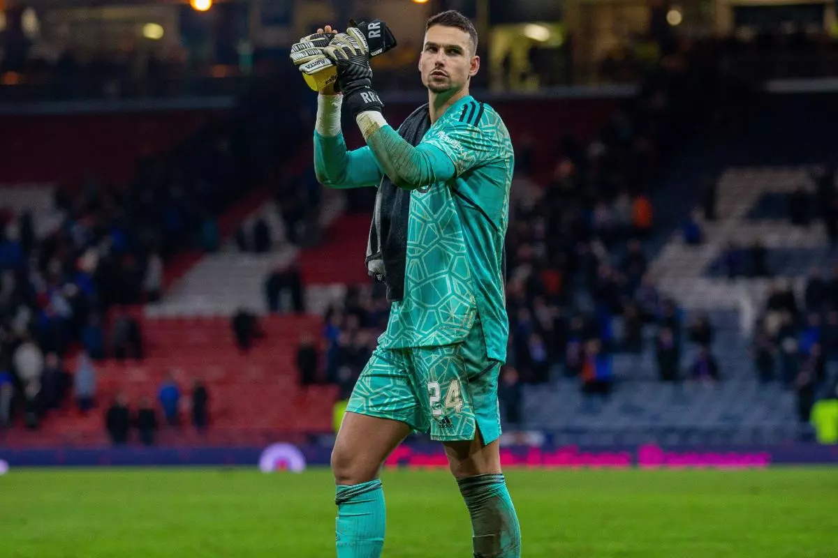 Kelle Roos of Aberdeen applauds the fans after the extra time loss