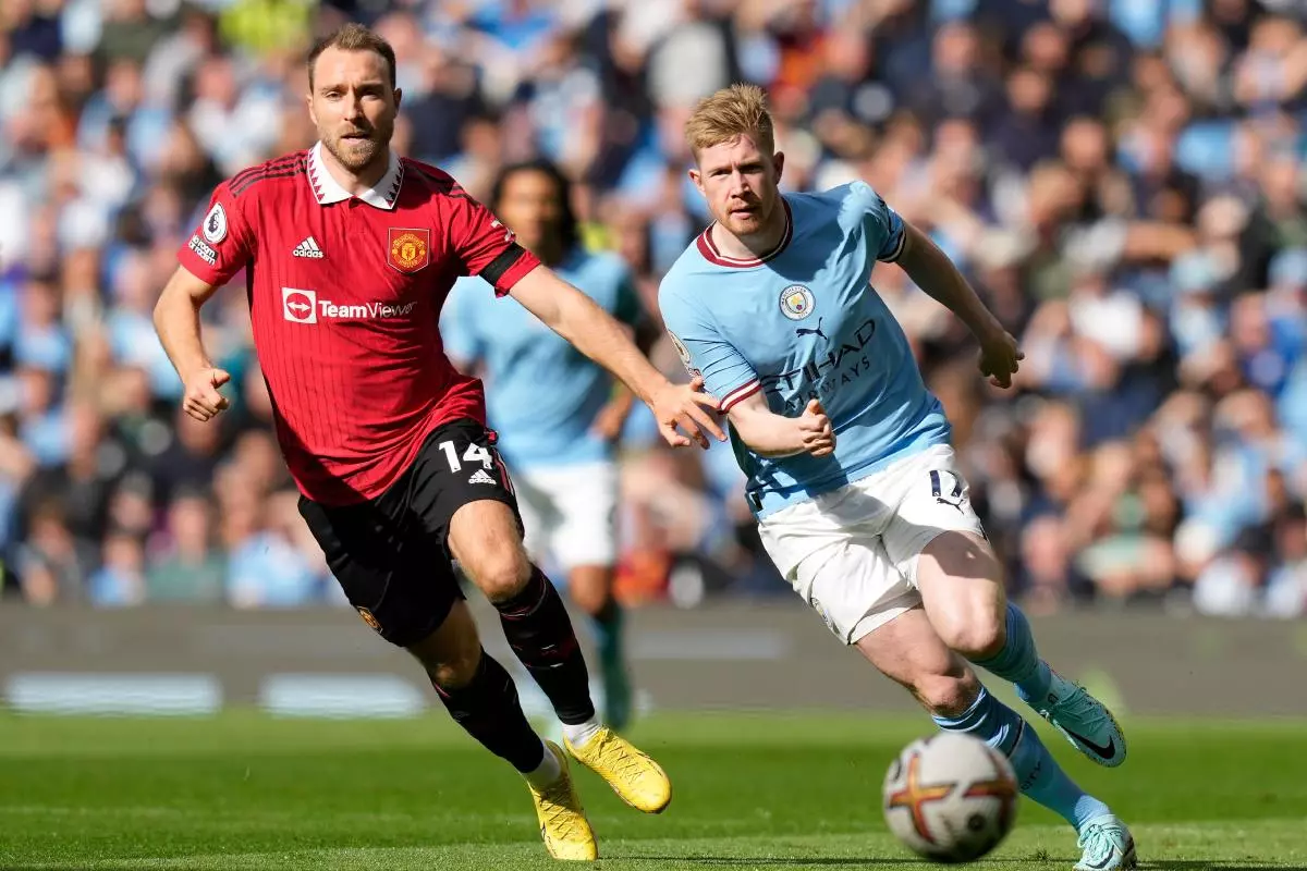 Kevin De Bruyne of Manchester City surges past Christian Eriksen of Manchester United - October 2022