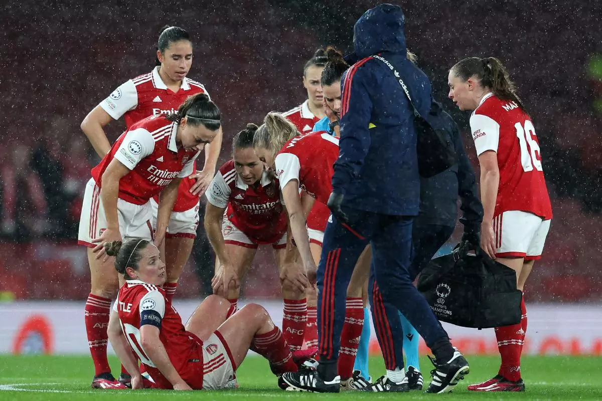 Kim Little of Arsenal goes off injured during the UEFA Womens Champions League match at the Emirates Stadium