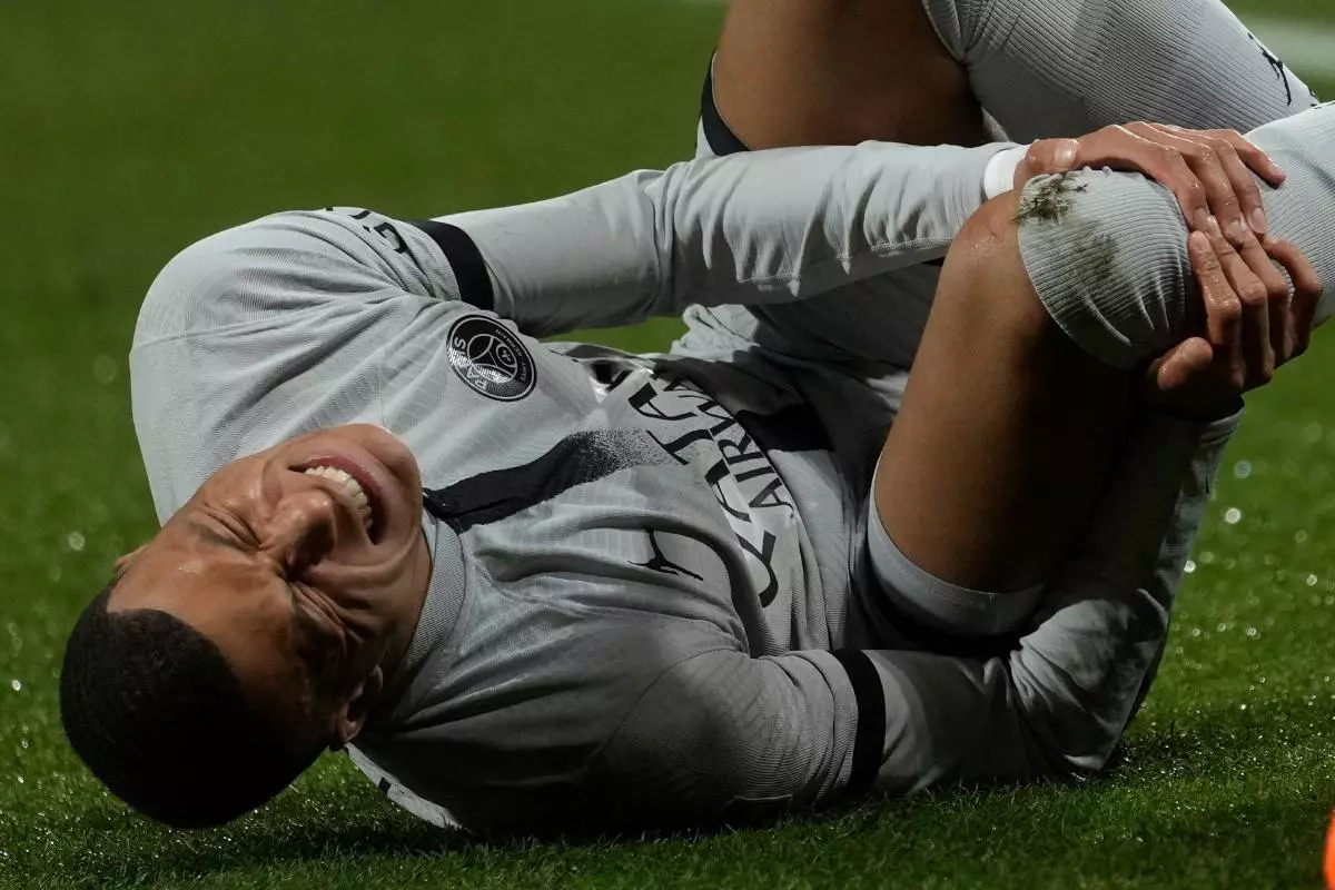 Injured PSG's Kylian Mbappe