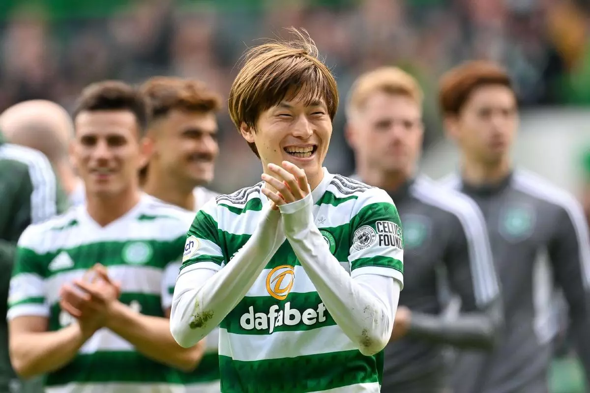 Kyogo Furuhashi of Celtic applauds the fans after the cinch Premiership match at Celtic Park - April 2023