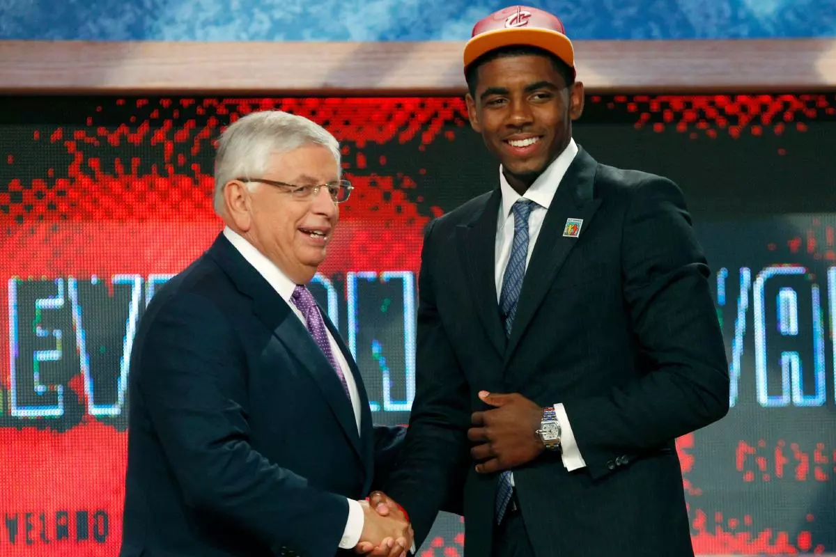 Kyrie Irving shakes hands with NBA commissioner David Stern selected by Cleveland Cavaliers