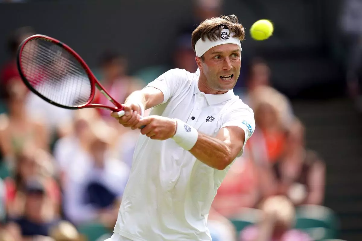 Liam Broady in action against Casper Ruud
