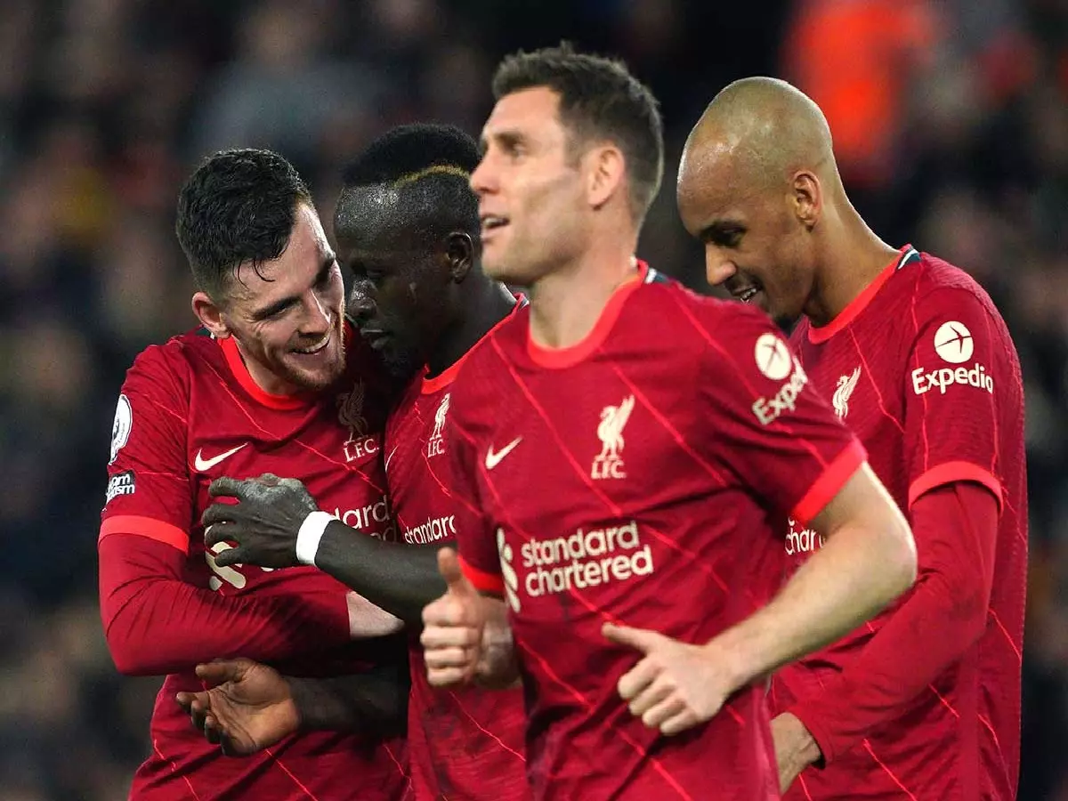 Liverpool celebrate during 6-0 thrashing of Leeds
