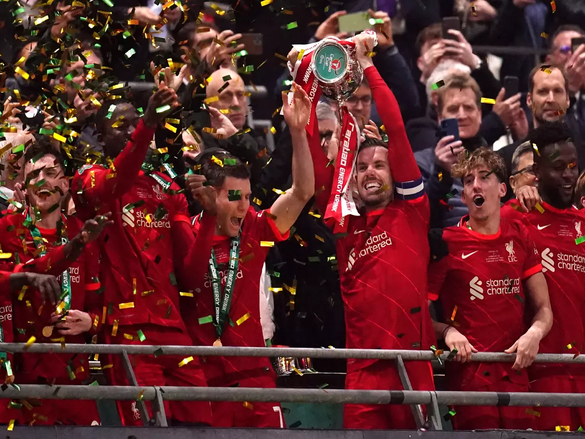 Liverpool players celebrate after winning the Carabao Cup final at Wembley Stadium, London. Picture date: Sunday 27th February, 2022.