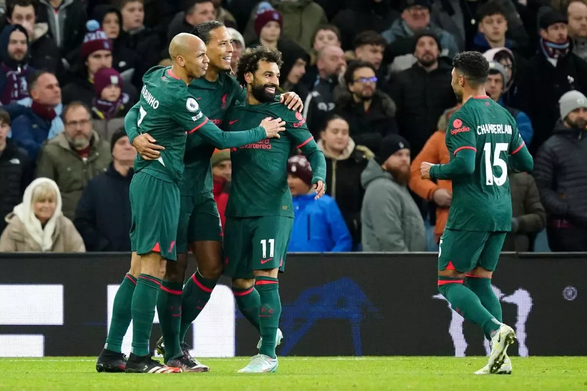Liverpool's Virgil van Dijk (second left) celebrates with team-mates after scoring his side's second goal