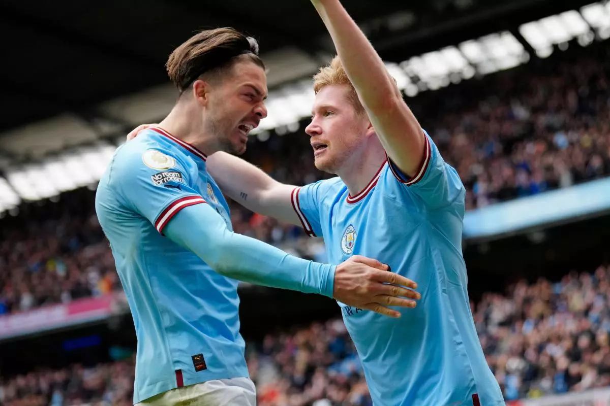 Manchester City's Kevin De Bruyne, right, celebrates with teammate Jack Grealish