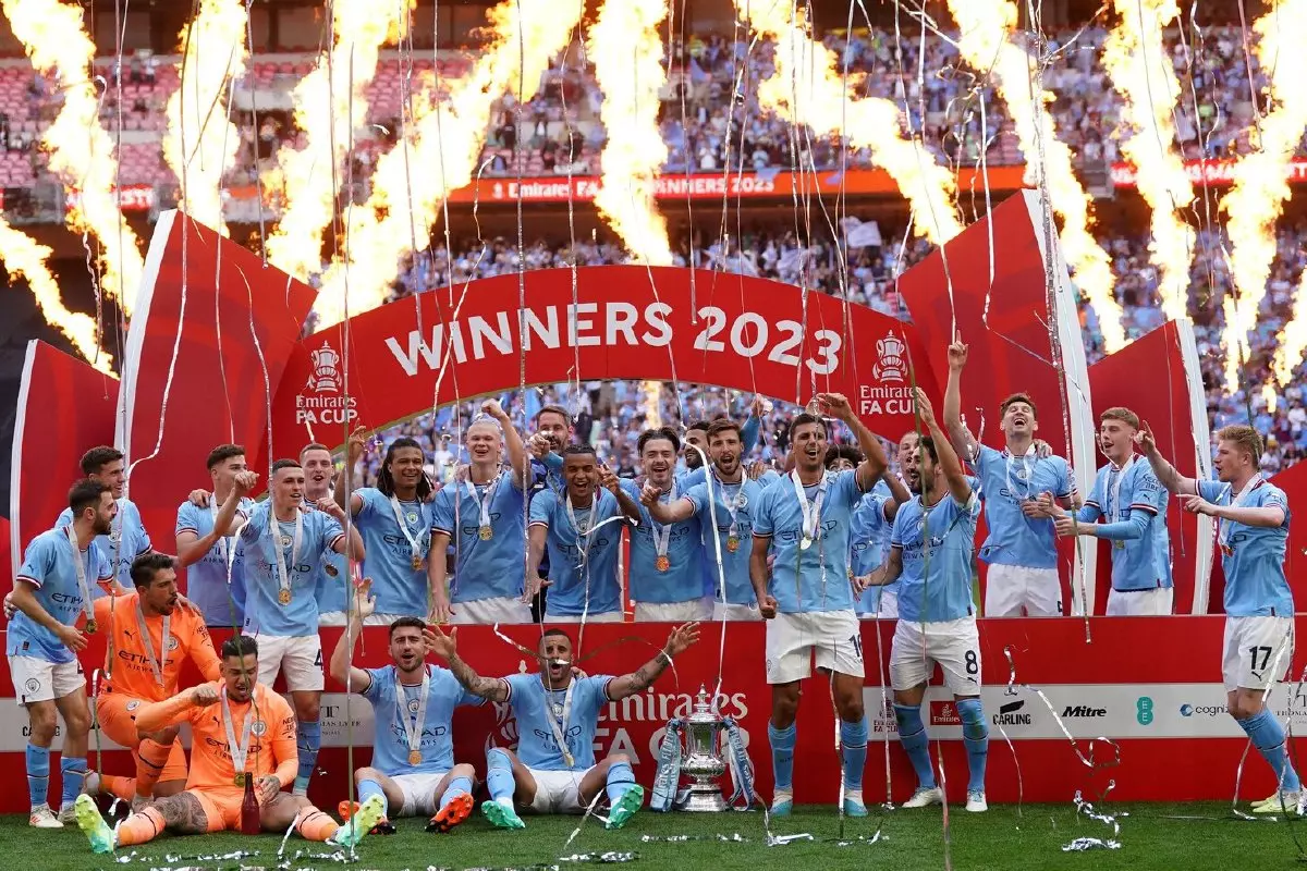 Manchester City's players celebrates winning the FA Cup