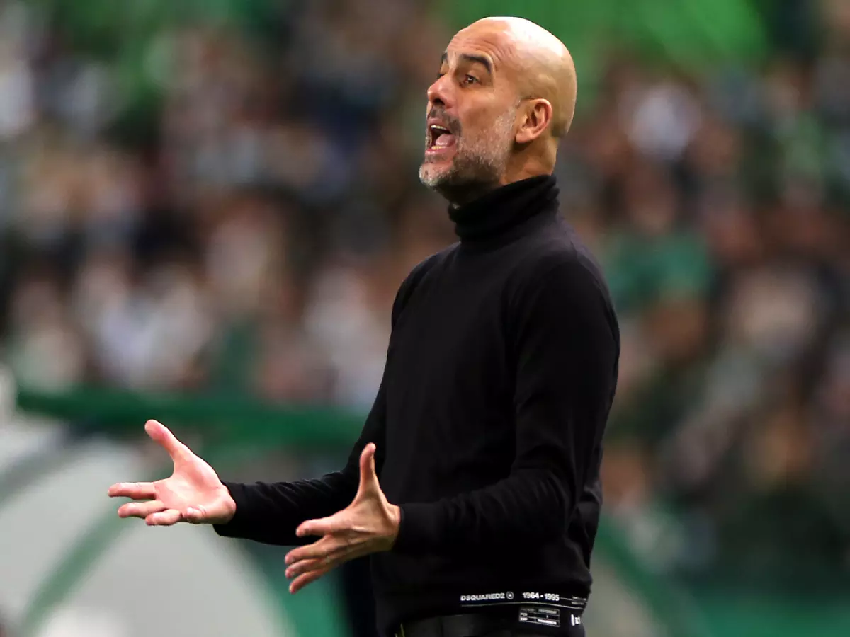 Manchester City manager Pep Guardiola reacts during the UEFA Champions League Round of 16 1st Leg match at the Jose Alvalade Stadium, Lisbon. Picture date: Tuesday February 15, 2022.