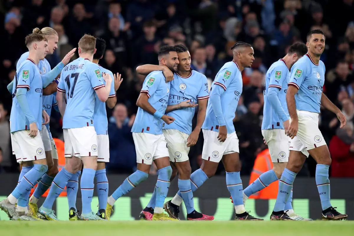 Manchester City's Riyad Mahrez celebrates scoring against Liverpool