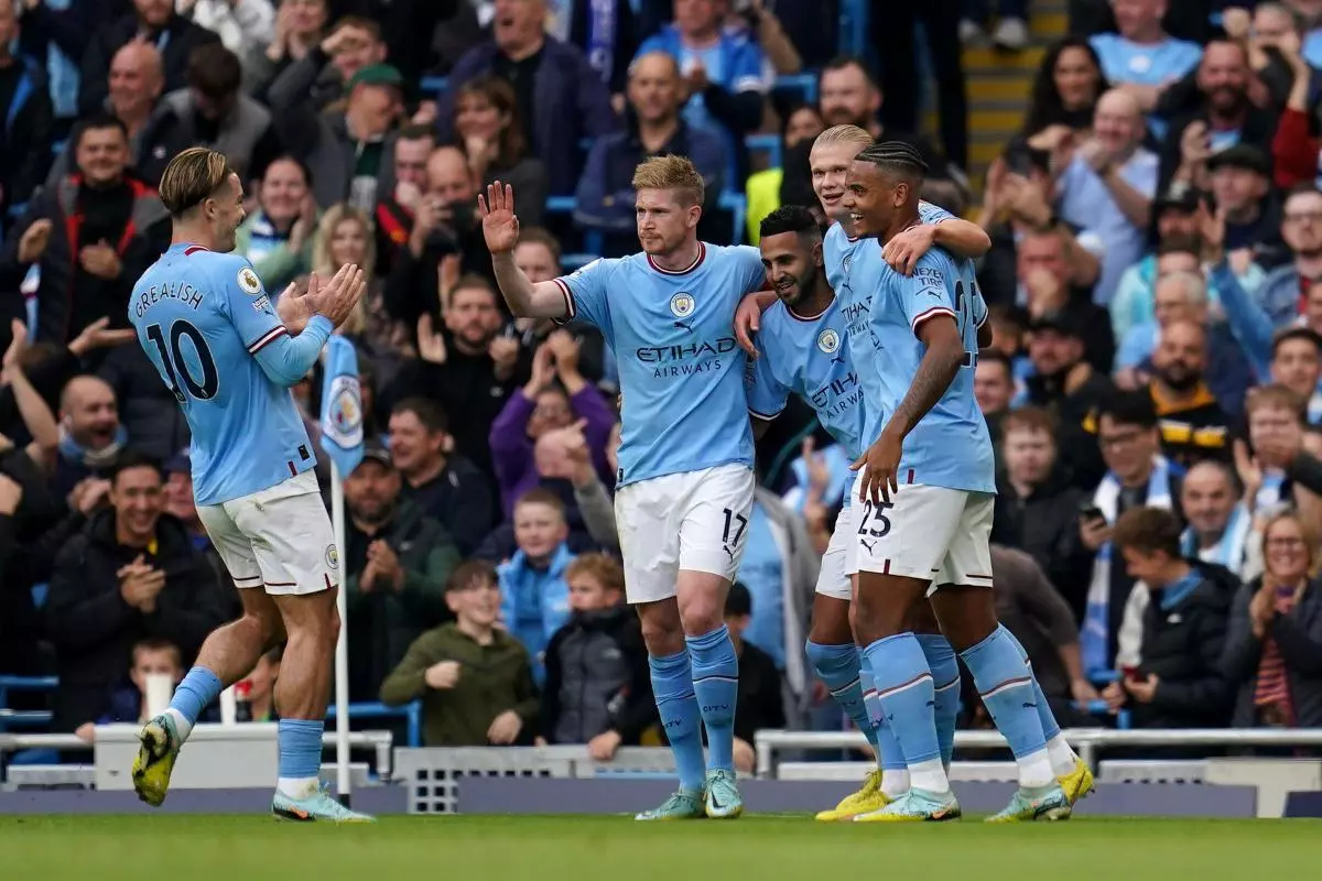 Manchester City's Erling Haaland (second right) celebrates scoring