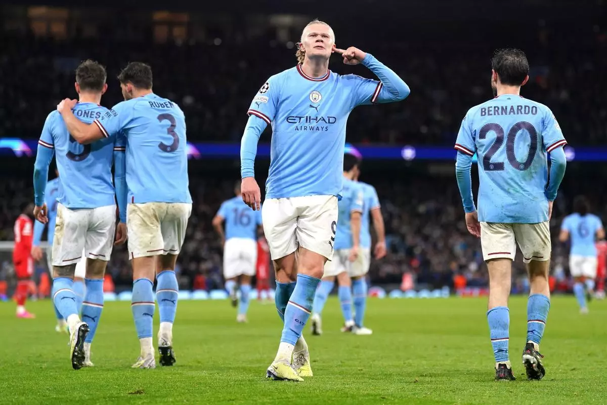 Manchester City's Erling Haaland (centre) celebrates