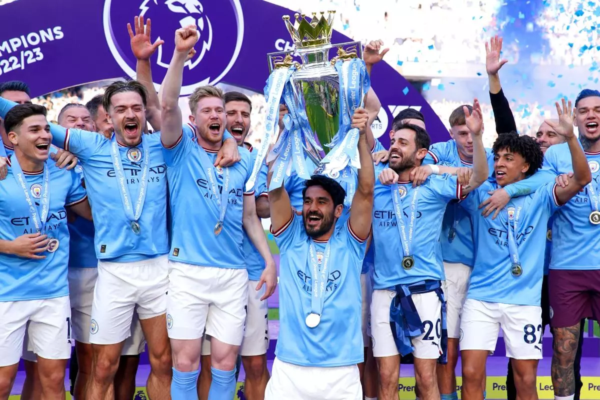 Manchester City's Ilkay Gundogan lifts the Premier League trophy