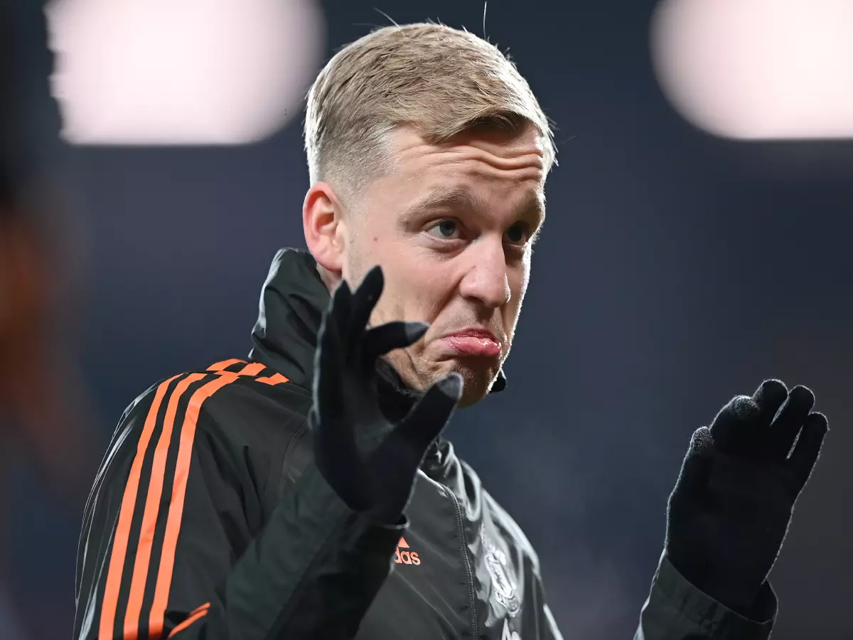Manchester United's Donny van de Beek warming up before the Premier League match at Old Trafford, Manchester.