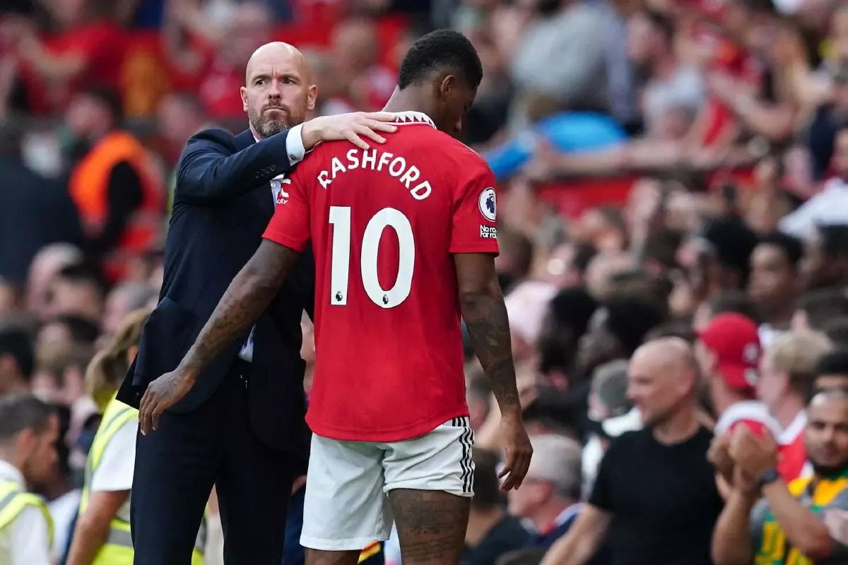 Manchester United manager Erik ten Hag embraces Marcus Rashford after he is substituted during the Premier League match at Old Trafford