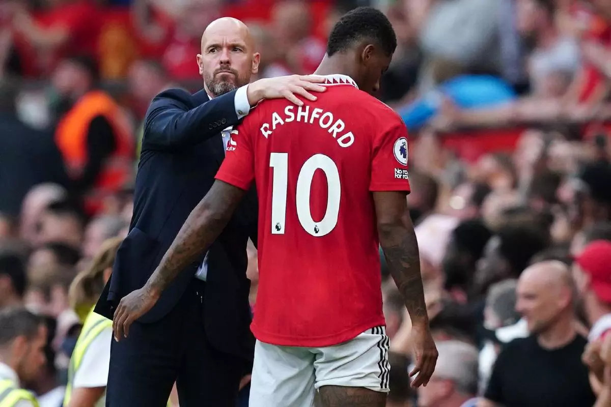 Manchester United manager Erik ten Hag embraces Marcus Rashford