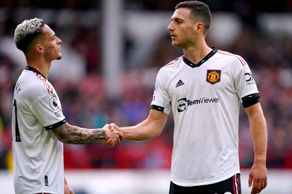 Manchester United's Diogo Dalot (right) celebrates with Antony after scoring
