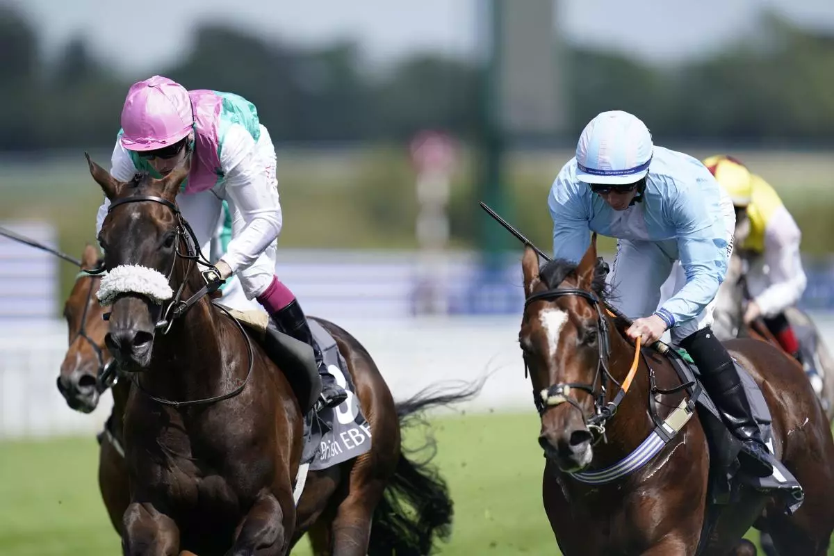 Mansa Musa ridden by Rossa Ryan (right) wins the British EBF 40th Anniversary Maiden Stakes - Aug 2023