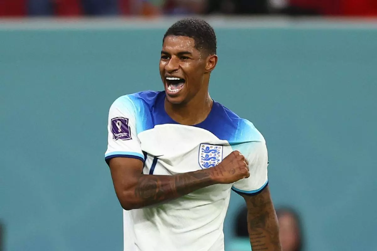 Marcus Rashford of England celebrates scoring their third goal against Wales