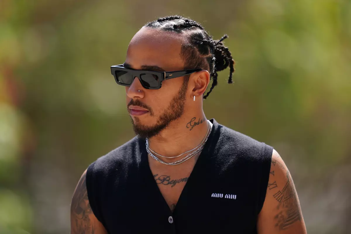 Mercedes' Lewis Hamilton who will be allowed to wear his nose stud after he was awarded an FIA medical exemption - March 2023