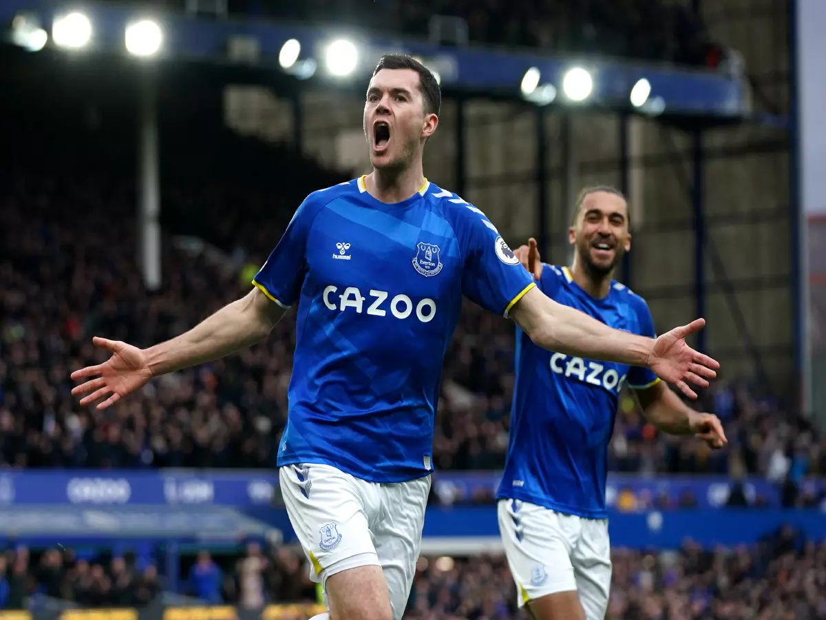 Michael Keane celebrates his goal against Leeds United