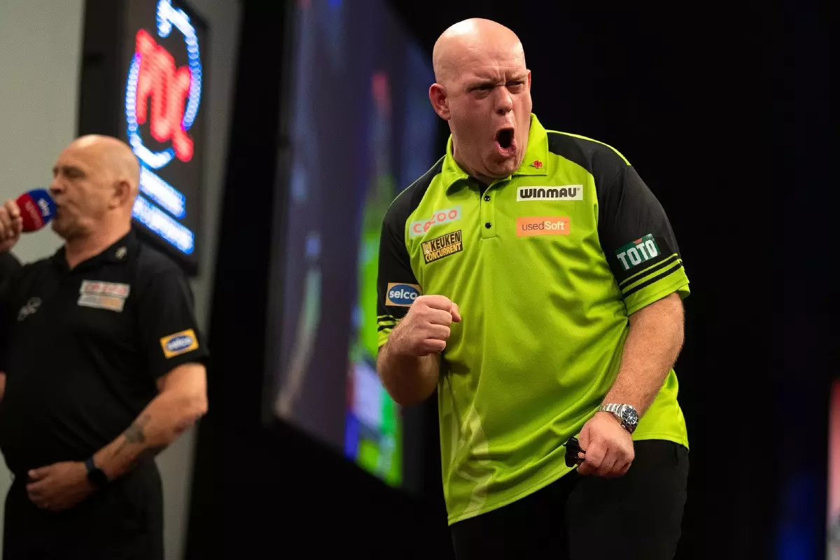 Michael van Gerwen beat Nathan Rafferty on day one of the Cazoo Grand Slam of Darts Champions.jpg
