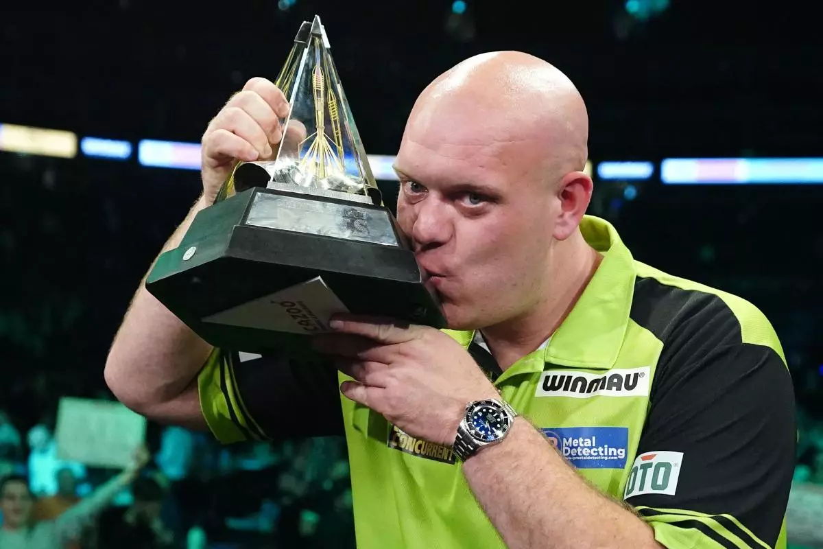 Michael van Gerwen celebrates winning the Cazoo Premier League