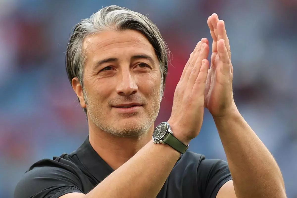 Murat Yakin, coach of Switzerland, cheers after the final whistle