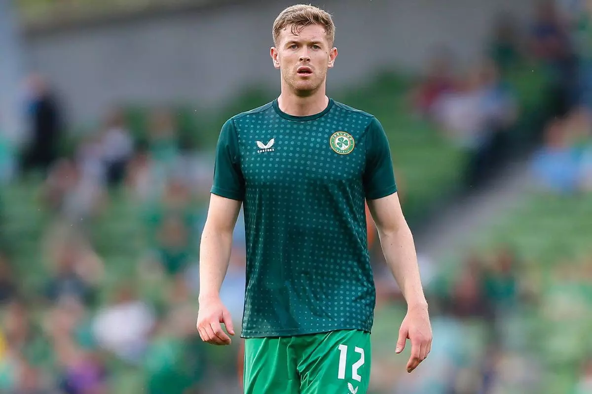 Nathan Collins of Ireland warms up prior to kickoff - June 2023