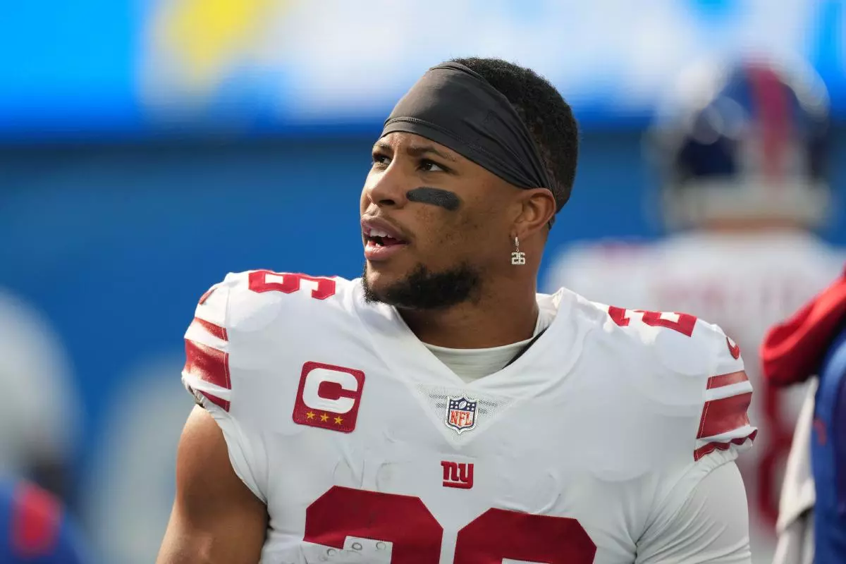 New York Giants Saquon Barkley looks into the crowd